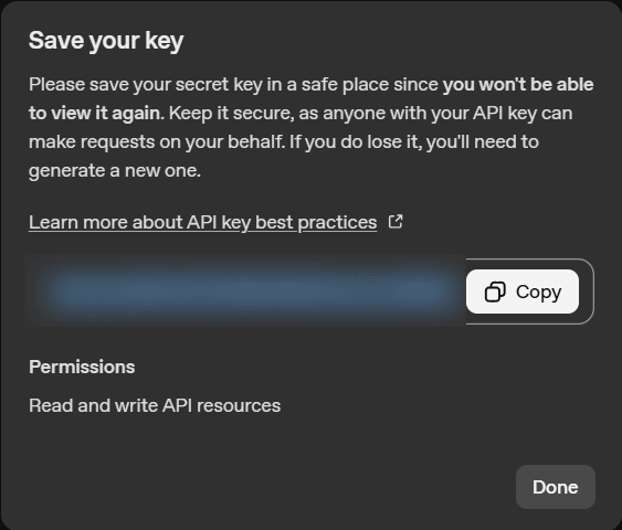 The Save your key window with the Copy button next to the new key